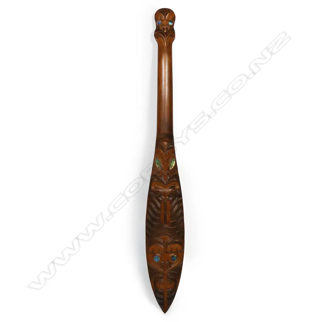 A contemporary carved Māori short waka hoe by Richard (Rangi) Redman, Image 1++
